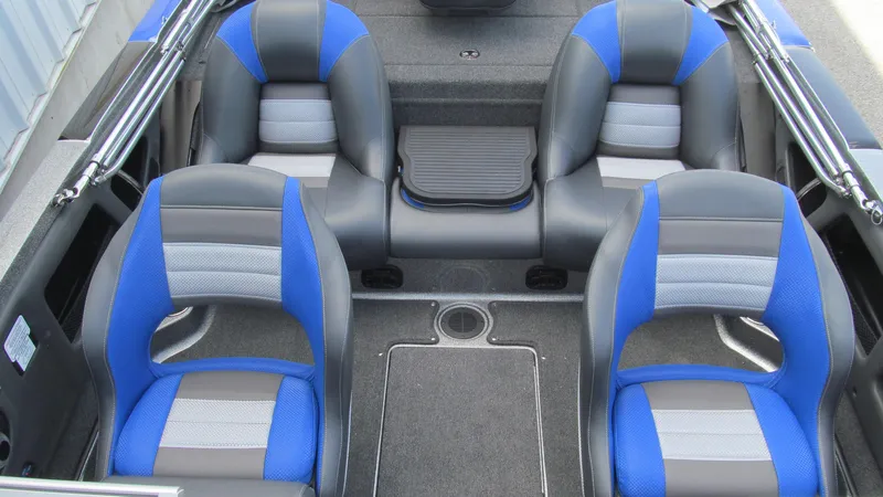 Slide: The Image of 2025 Ranger 212LS boat interior with blue and gray seating, spacious layout. - 13