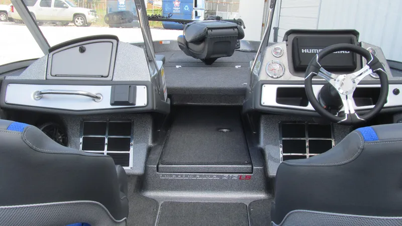 Slide: The Image of 2025 Ranger 212LS boat interior with modern dashboard and steering wheel. - 6