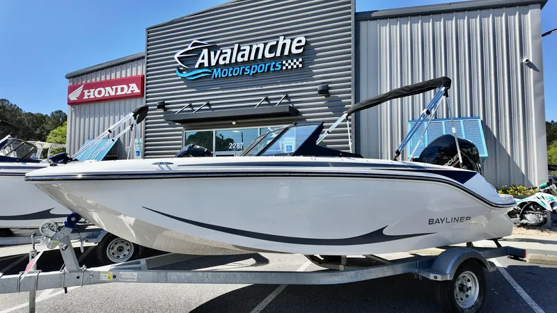 The Image of 2025 Bayliner M17 boat on trailer at Avalanche Motorsports dealership. - 0