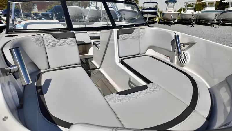 Slide: The Image of 2025 Bayliner M17 boat interior with sleek seating and modern design. - 12