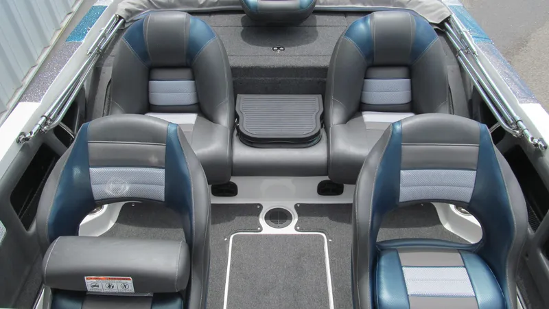 Slide: The Image of 2025 Ranger 212LS boat interior with four cushioned seats and sleek design. - 11