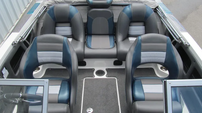 Slide: The Image of 2025 Ranger 212LS boat interior with sleek seating and modern design. - 12