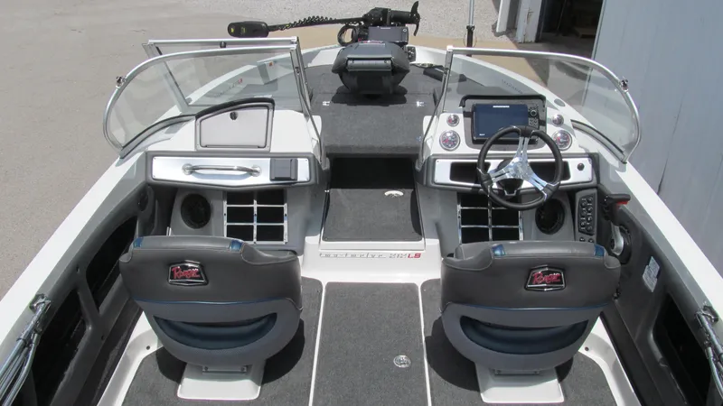 Slide: The Image of 2025 Ranger 212LS boat interior with dual consoles and modern dashboard. - 5