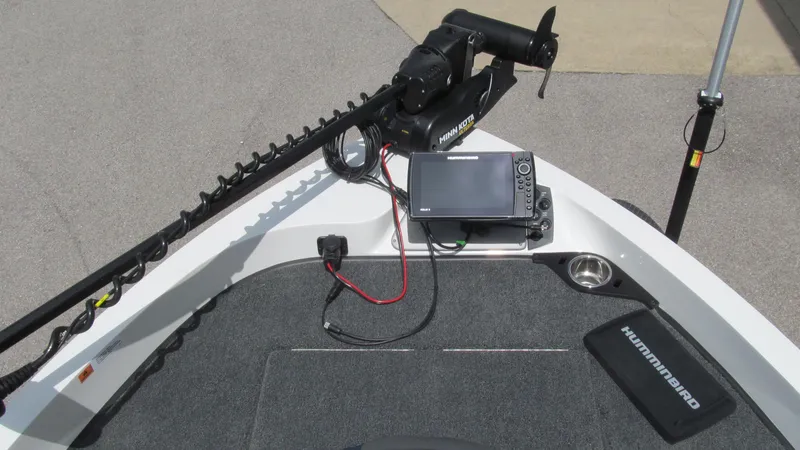 Slide: The Image of 2025 Ranger 212LS boat with Humminbird electronics and trolling motor. - 8