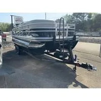 Slide: The Image of 2025 Ranger Reata 223FC pontoon boat on trailer in outdoor setting. - 9