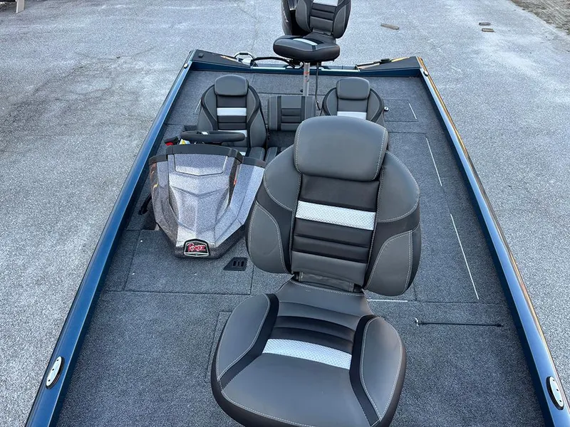 Slide: The Image of 2025 Ranger RT178C boat interior with sleek seating and modern design. - 11