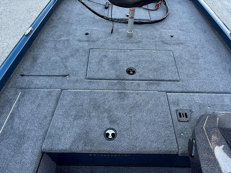Slide: The Image of 2025 Ranger RT178C boat deck with storage compartments and seating area. - 13