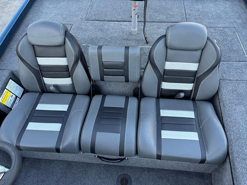 Slide: The Image of 2025 Ranger RT178C boat seats with gray and black upholstery. - 17