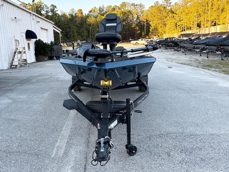 Slide: The Image of 2025 Ranger RT178C boat on trailer in outdoor lot. - 3