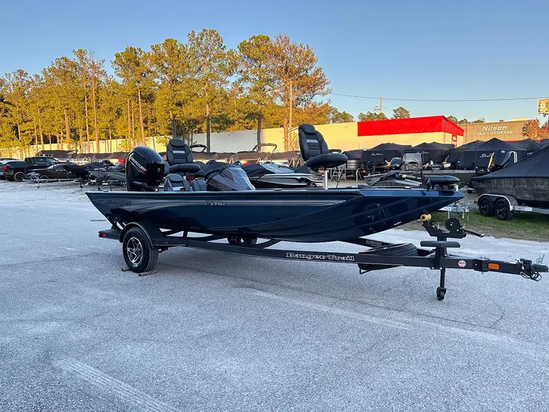 Slide: The Image of 2025 Ranger RT178C fishing boat on trailer in outdoor lot. - 4