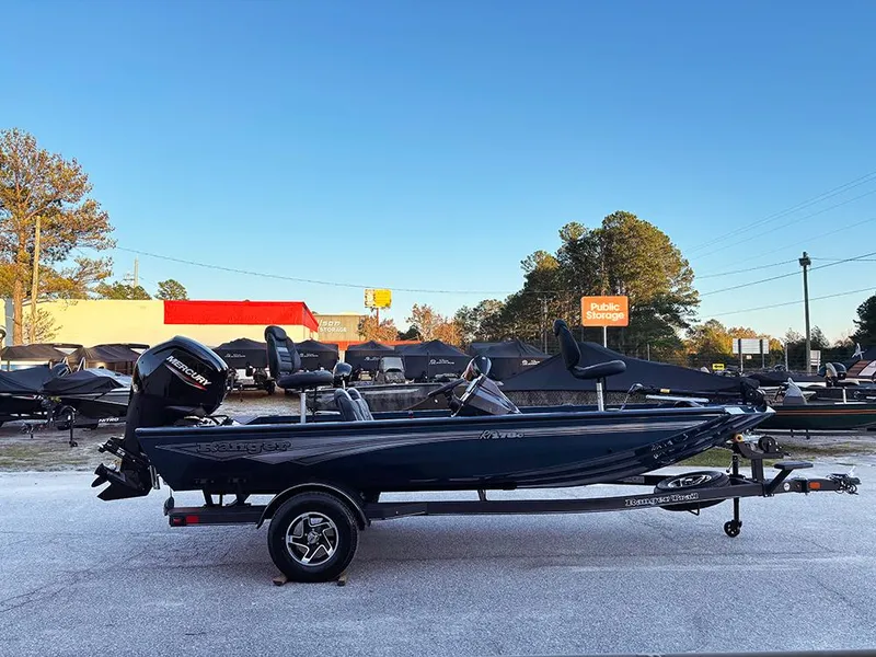 Slide: The Image of 2025 Ranger RT178C fishing boat on trailer, parked outdoors. - 5