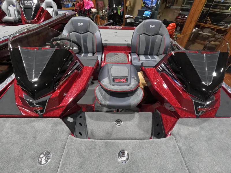 Slide: The Image of 2025 Ranger Z521 boat interior with dual seats and sleek red design. - 5