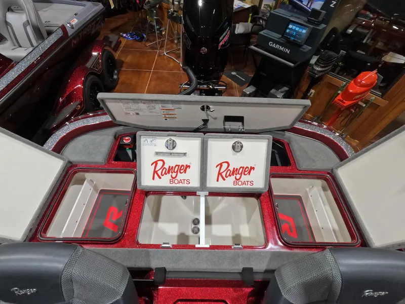 Slide: The Image of 2025 Ranger Z521 boat interior with storage compartments and branding. - 8