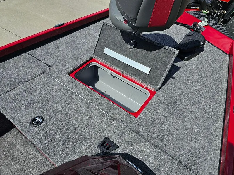 Slide: The Image of 2025 Ranger RT178C boat deck with open storage compartment and seat. - 15