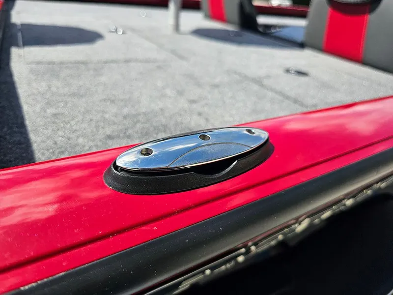 Slide: The Image of 2025 Ranger RT178C boat interior with red trim and chrome detail. - 23