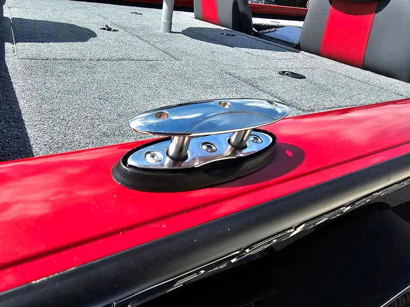 Slide: The Image of 2025 Ranger RT178C boat with red and gray interior, featuring a chrome cleat. - 24