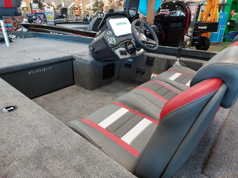 Slide: The Image of 2025 Ranger RT188C boat interior with steering wheel and seating. - 3
