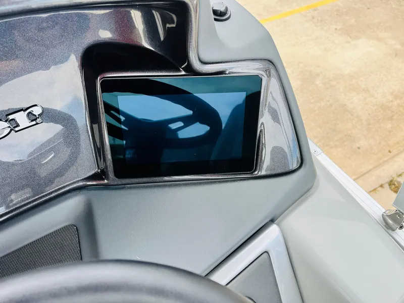 Slide: The Image of 2025 Ranger Reata 223FC dashboard with digital display screen. - 36