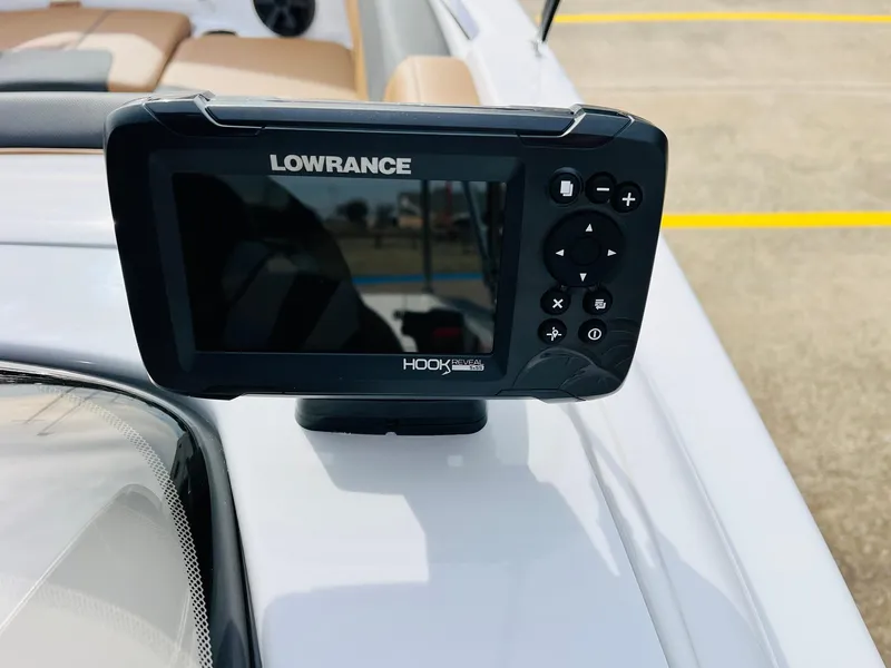 Slide: The Image of Lowrance Hook fish finder on 2025 Tahoe 2150 boat dashboard. - 42