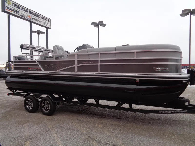 Slide: The Image of 2025 Ranger Reata 220FC pontoon boat on trailer at Tracker Boating Center. - 5