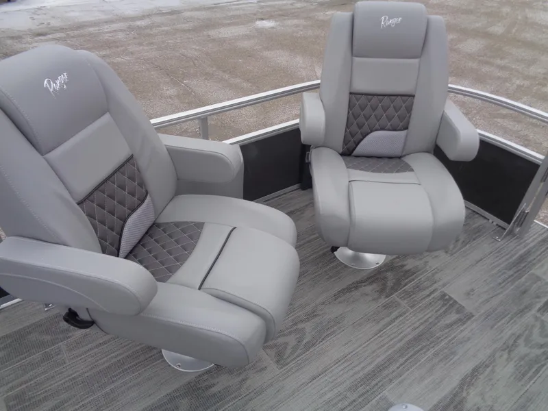 Slide: The Image of 2025 Ranger Reata 220FC boat seats with gray upholstery and diamond stitching. - 8