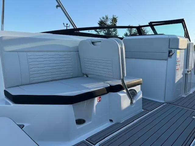Slide: The Image of 2025 Sea Ray SPX 230 boat interior with sleek seating and modern design. - 8
