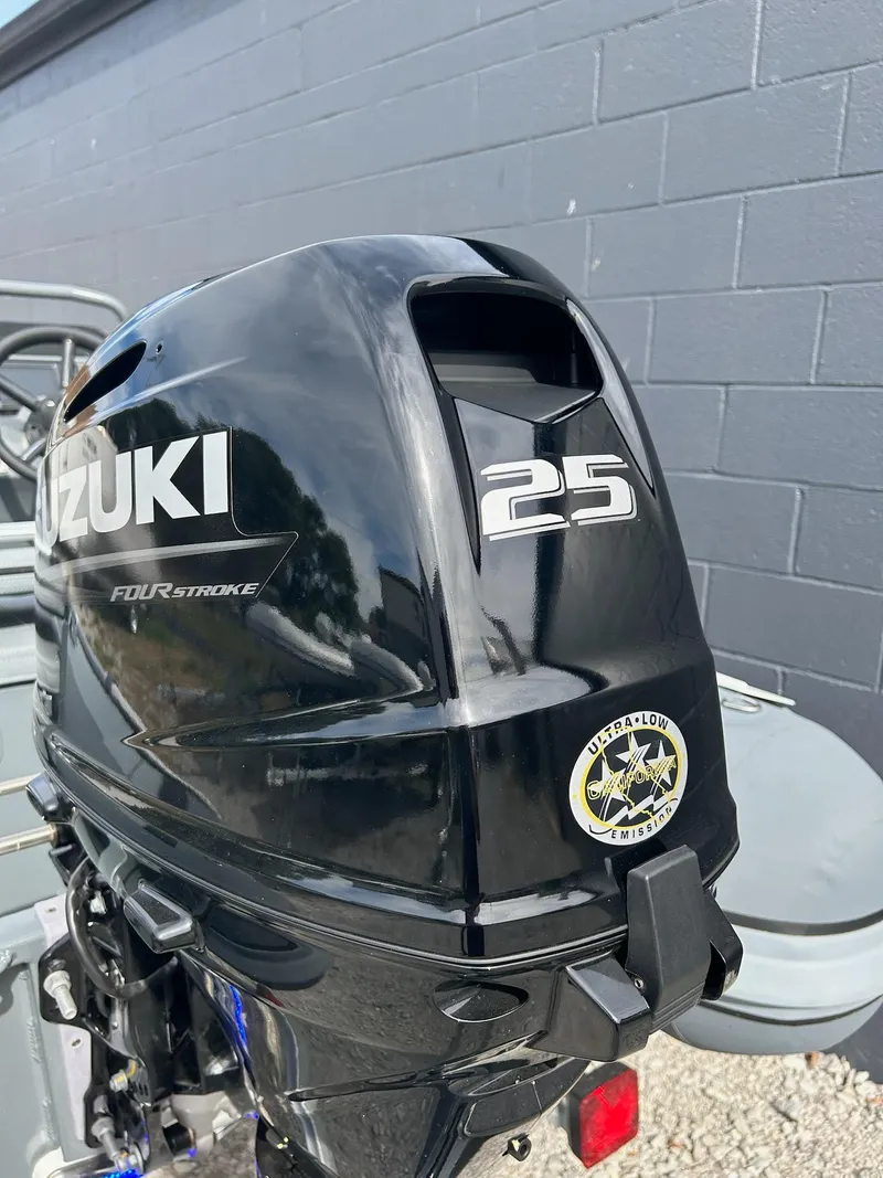 Slide: The Image of Suzuki 25 horsepower outboard motor on 2023 Highfield Classic 340 GT boat. - 21