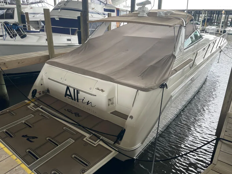 Slide: The Image of 1996 Sea Ray 500 Sundancer docked, covered, and ready for adventure. - 18