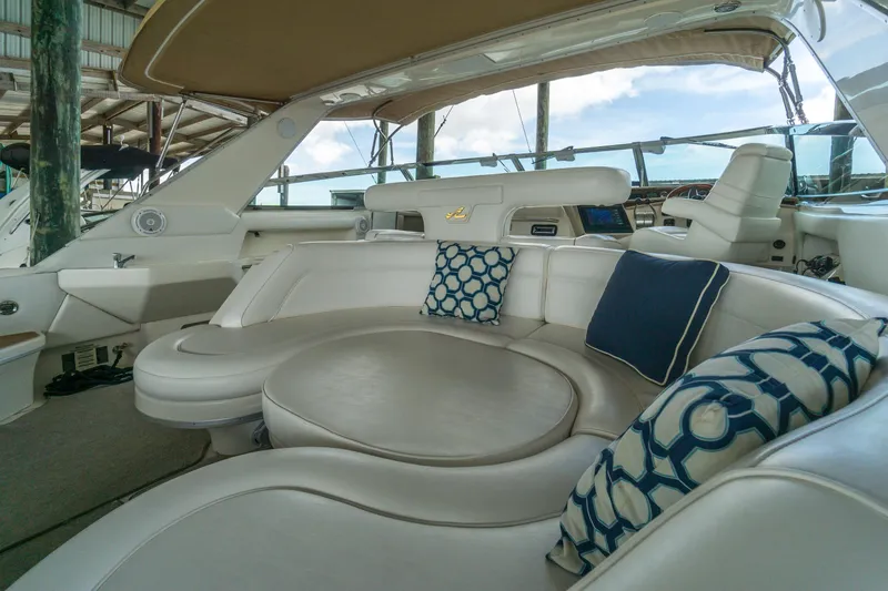 Slide: The Image of Luxurious 1996 Sea Ray 500 Sundancer yacht interior with plush seating and decorative cushions. - 40