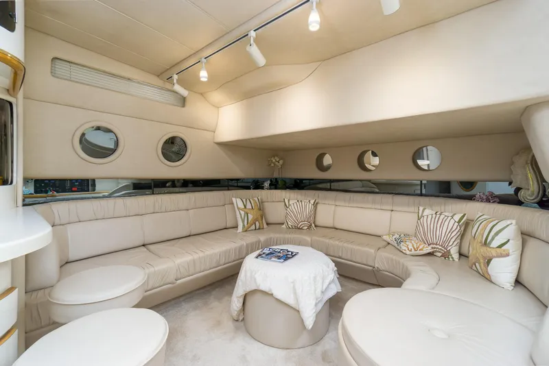 Slide: The Image of Luxurious interior of 1996 Sea Ray 500 Sundancer yacht with plush seating and elegant decor. - 44