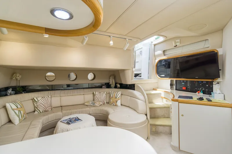 Slide: The Image of Luxurious interior of 1996 Sea Ray 500 Sundancer yacht with plush seating and modern amenities. - 46