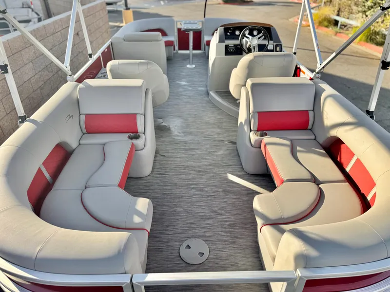Slide: The Image of 2021 Bennington 23 LS RSD pontoon boat interior with plush seating and modern design. - 18