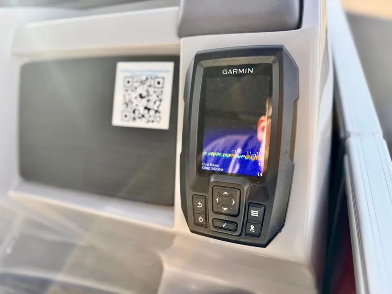 Slide: The Image of Garmin device on 2021 Bennington 23 LS RSD boat dashboard with QR code. - 23