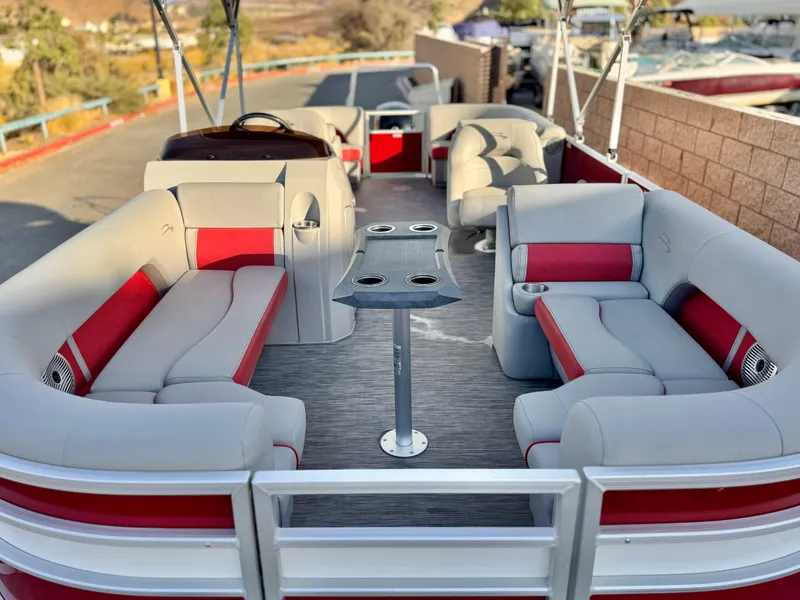 Slide: The Image of 2021 Bennington 23 LS RSD pontoon boat with spacious seating and modern design. - 9