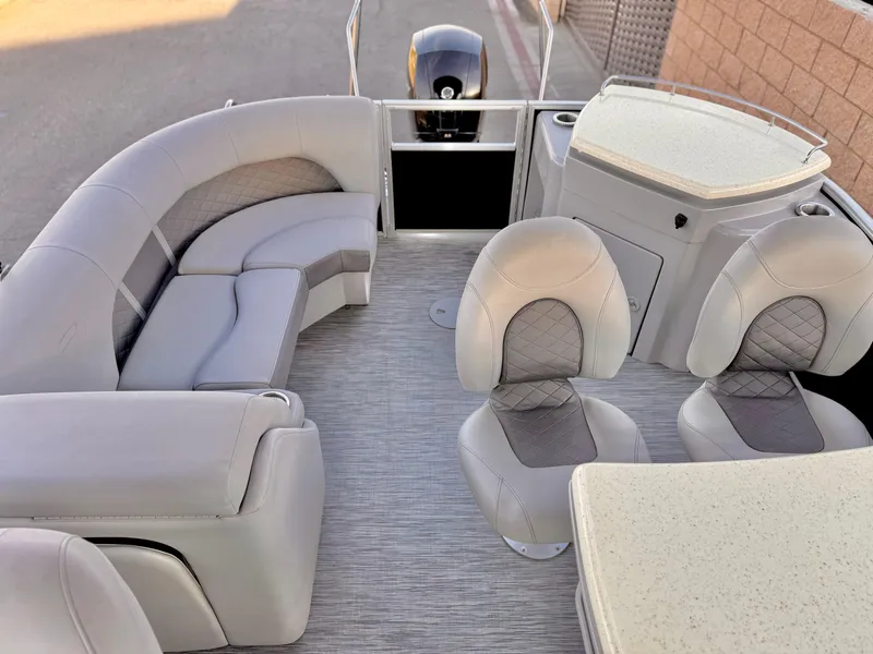 Slide: The Image of 2021 Bennington 23 LPD boat interior with plush seating and modern design. - 16