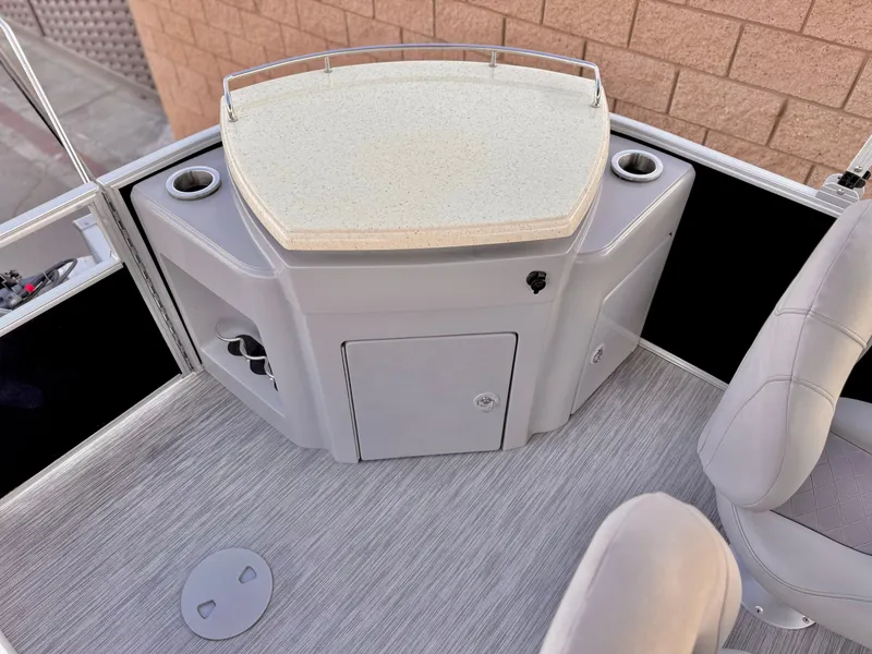 Slide: The Image of 2021 Bennington 23 LPD boat interior with seating and storage area. - 18