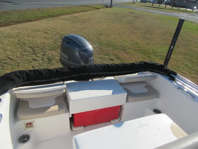 Slide: The Image of 2016 Robalo R160 Center Console boat with Yamaha 70 engine, rear seating area. - 18