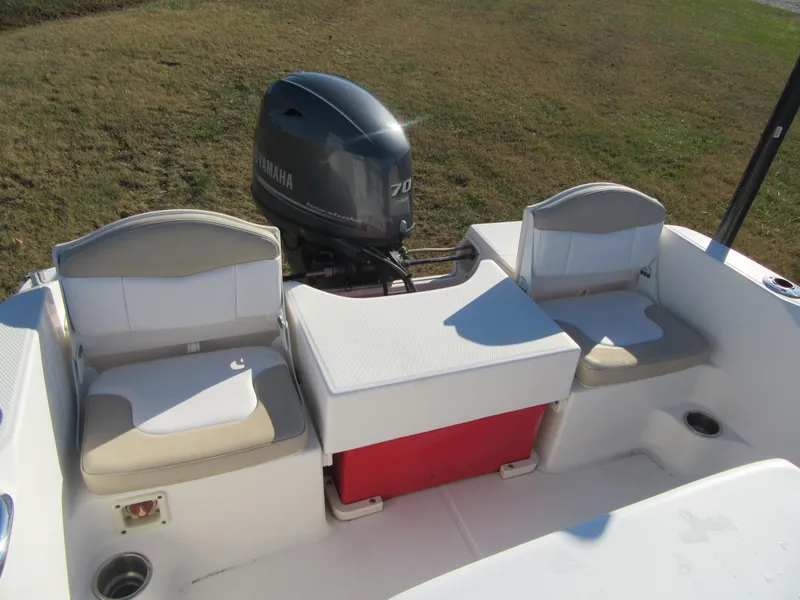 Slide: The Image of 2016 Robalo R160 Center Console boat with Yamaha 70 engine, rear seating view. - 19