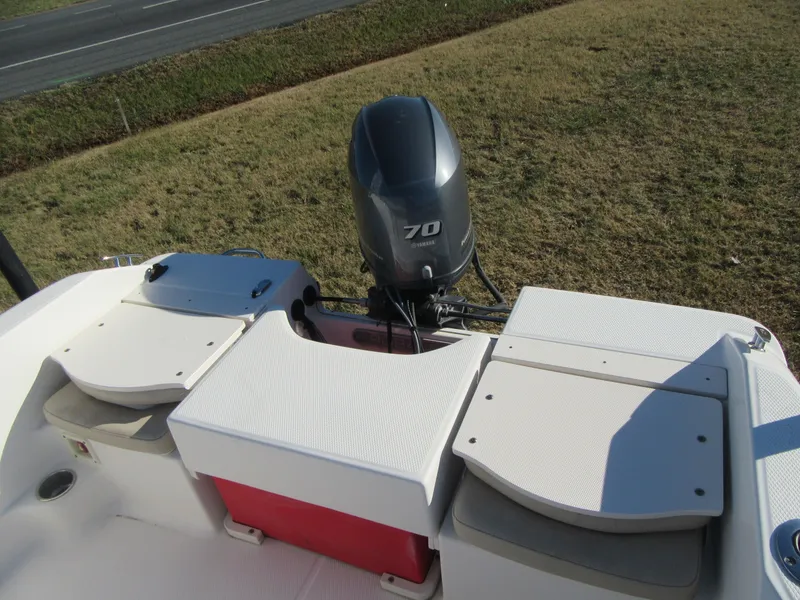 Slide: The Image of 2016 Robalo R160 Center Console boat with 70 HP outboard motor. - 20