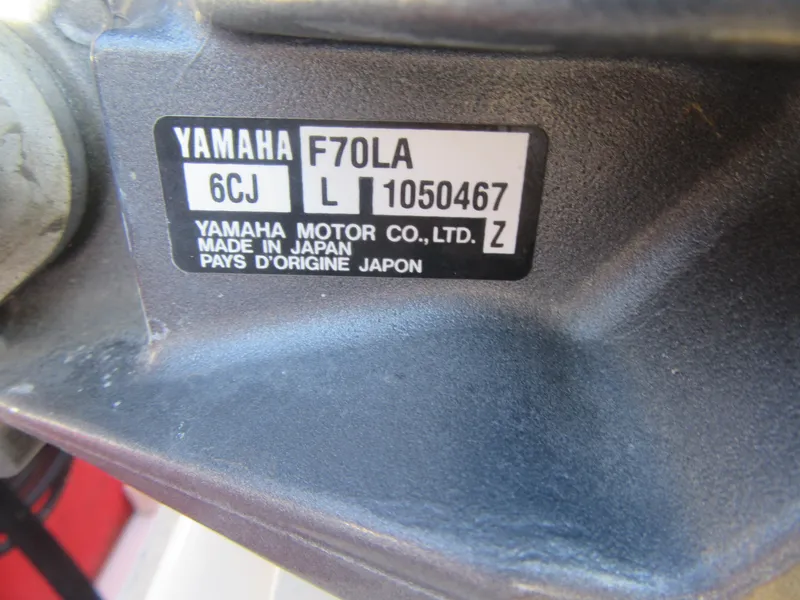 Slide: The Image of Yamaha F70LA engine label on 2016 Robalo R160 Center Console boat. - 5