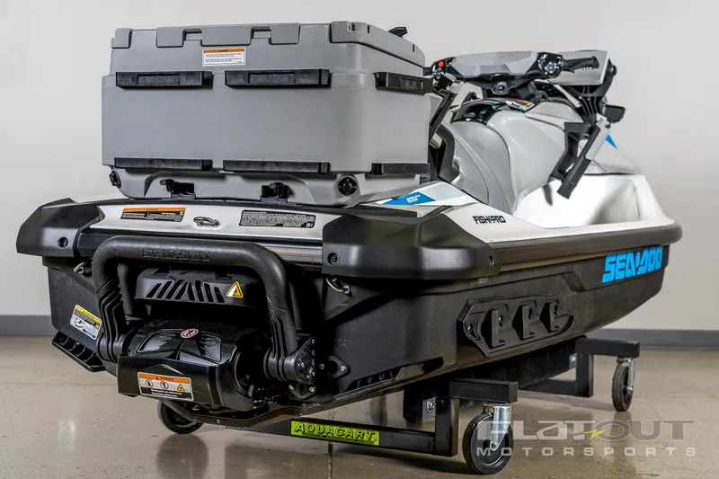 Slide: The Image of 2024 Sea-Doo Fish Pro 130 Scout, rear view, showcasing storage and design features. - 10