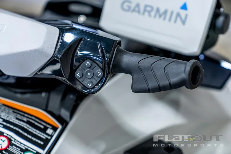 Slide: The Image of 2024 Sea-Doo Fish Pro 130 Scout handlebar with Garmin display, close-up view. - 17