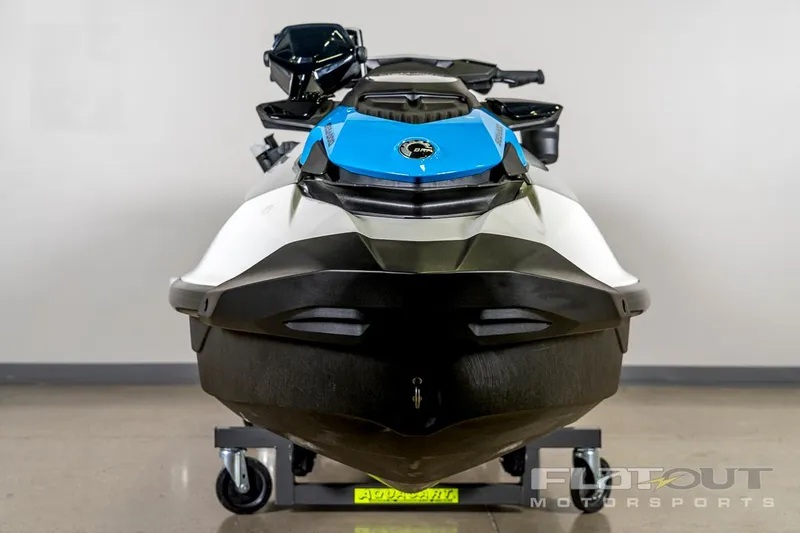 Slide: The Image of 2024 Sea-Doo Fish Pro 130 Scout jet ski, front view, displayed indoors. - 8