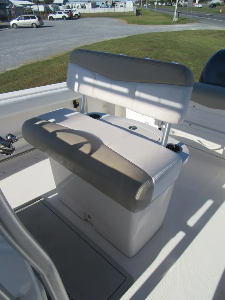Slide: The Image of 2018 Robalo R222 Center Console boat seat with storage compartment. - 13