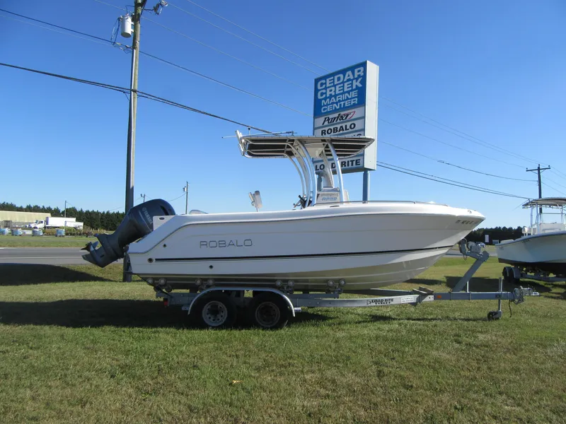 Slide: The Image of 2018 Robalo R222 Center Console boat on trailer at Cedar Creek Marine Center. - 20