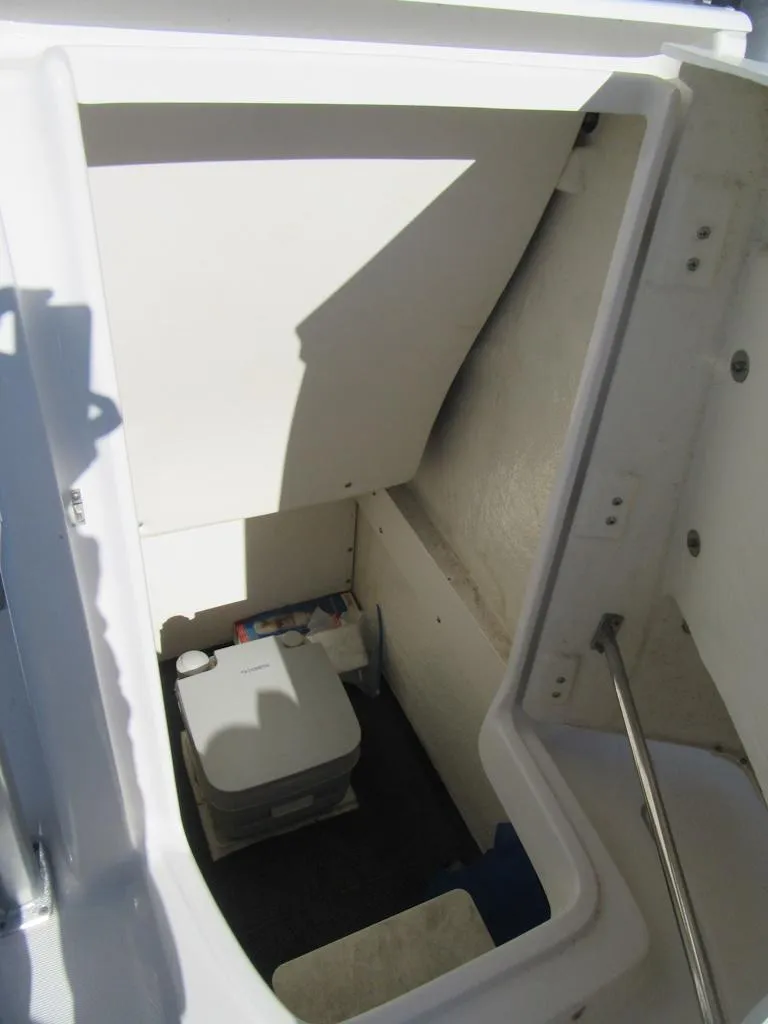 Slide: The Image of 2018 Robalo R222 Center Console boat interior storage compartment. - 7