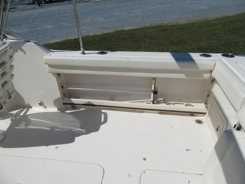 Slide: The Image of 2017 Grady-White 225 Freedom boat interior with seating and storage area. - 13