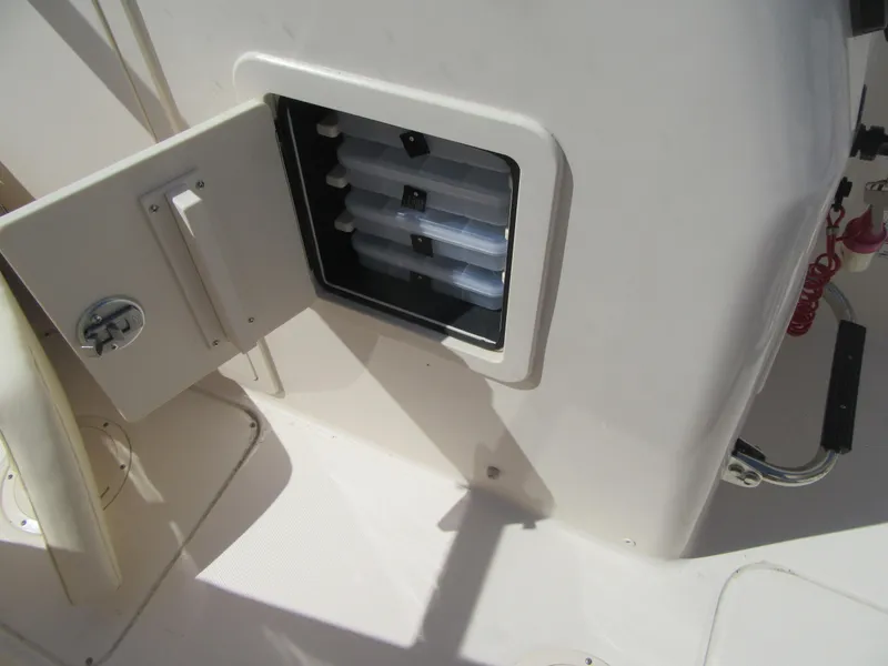 Slide: The Image of Open storage compartment on 2017 Grady-White 225 Freedom boat. - 22
