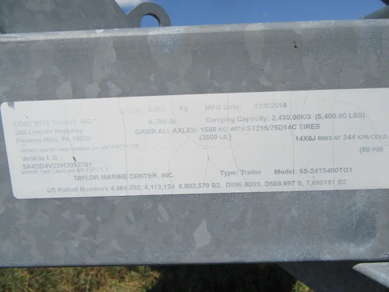 Slide: The Image of Label on a Grady-White 225 Freedom boat trailer, detailing specifications and manufacturing information. - 7