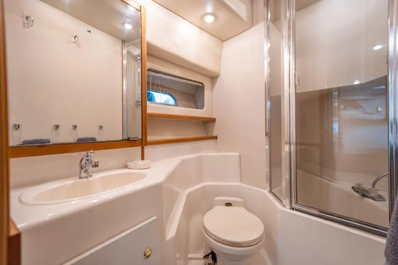 Slide: The Image of Luxurious bathroom in 2000 Bayliner 4788 Pilot House Motoryacht with modern fixtures. - 24